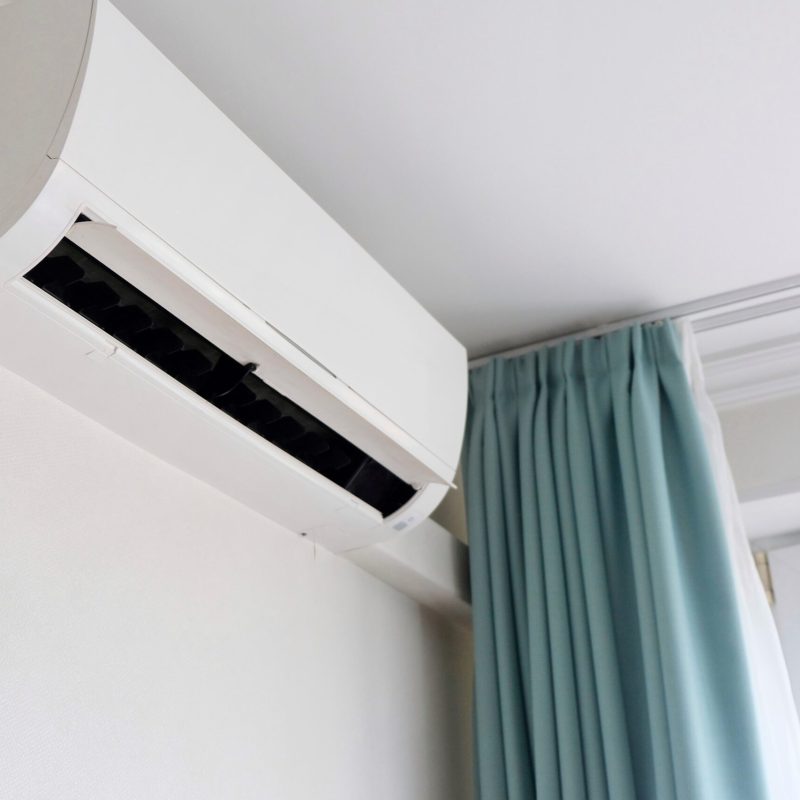 modern-air-conditioner-on-white-wall-indoors-2026-03-16-23-45-09-utc